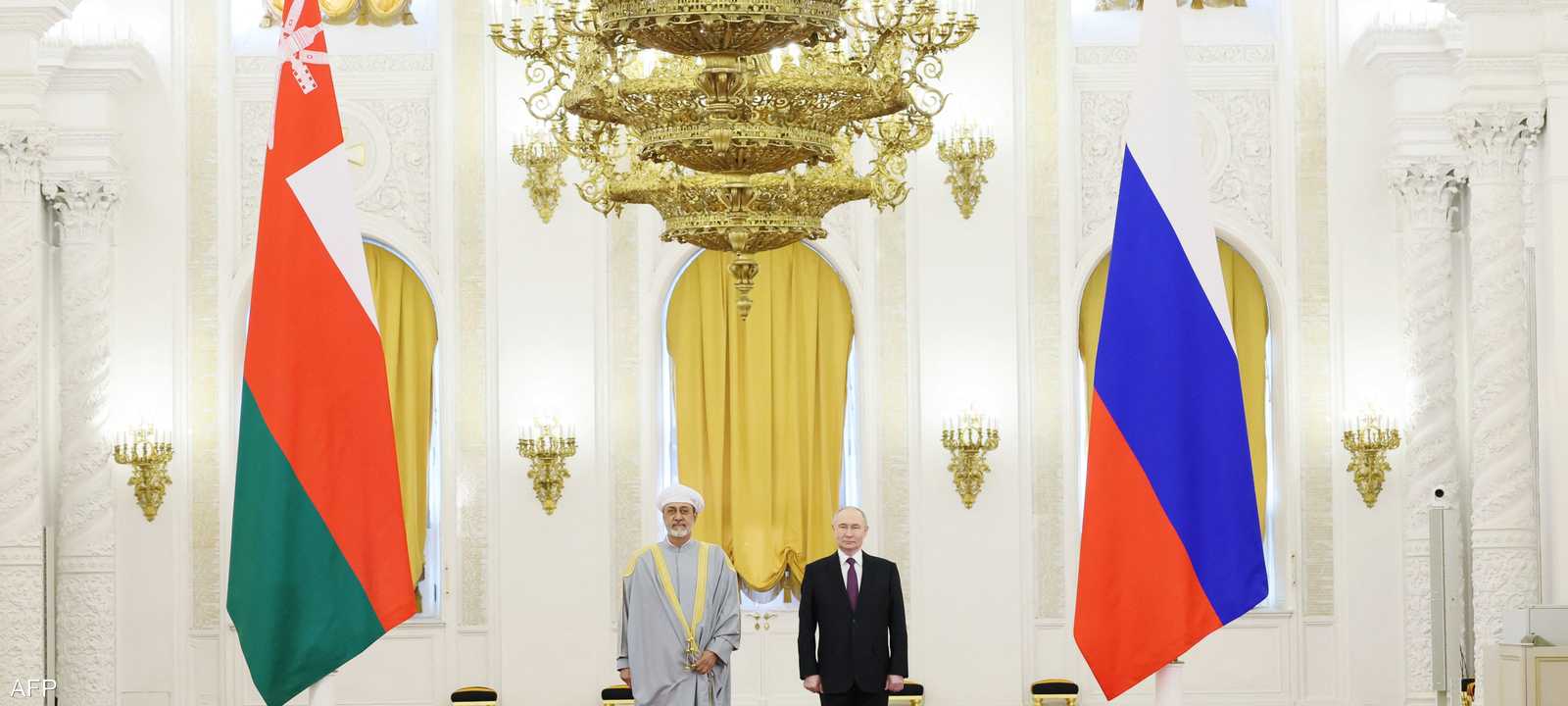 الرئيس الروسي لدى استقباله سلطان عمان