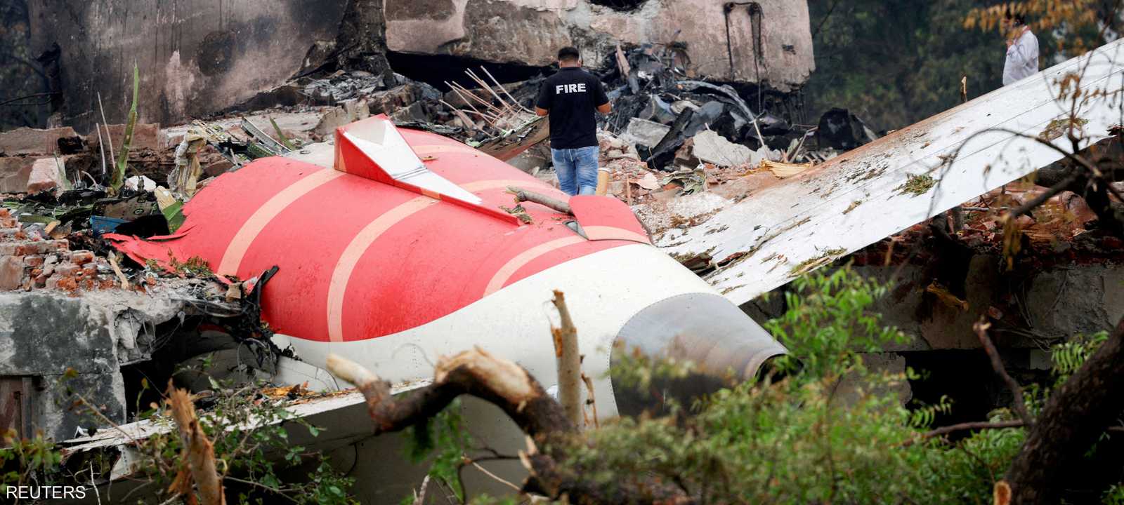 جزء من الطائرة المنكوبة بعد تحطمها