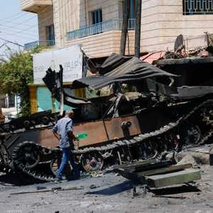 آلية عسكرية مدمرة في السويداء.. أرشيفية