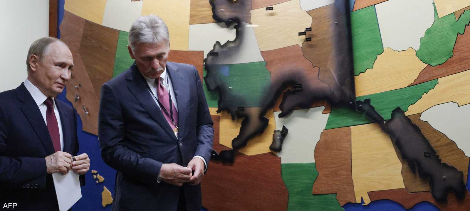 بوتين أمام خريطة للولايات المتحدة