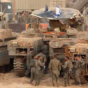 إسرائيل تسمح بدخول حماس والصليب الأحمر المنطقة الصفراء