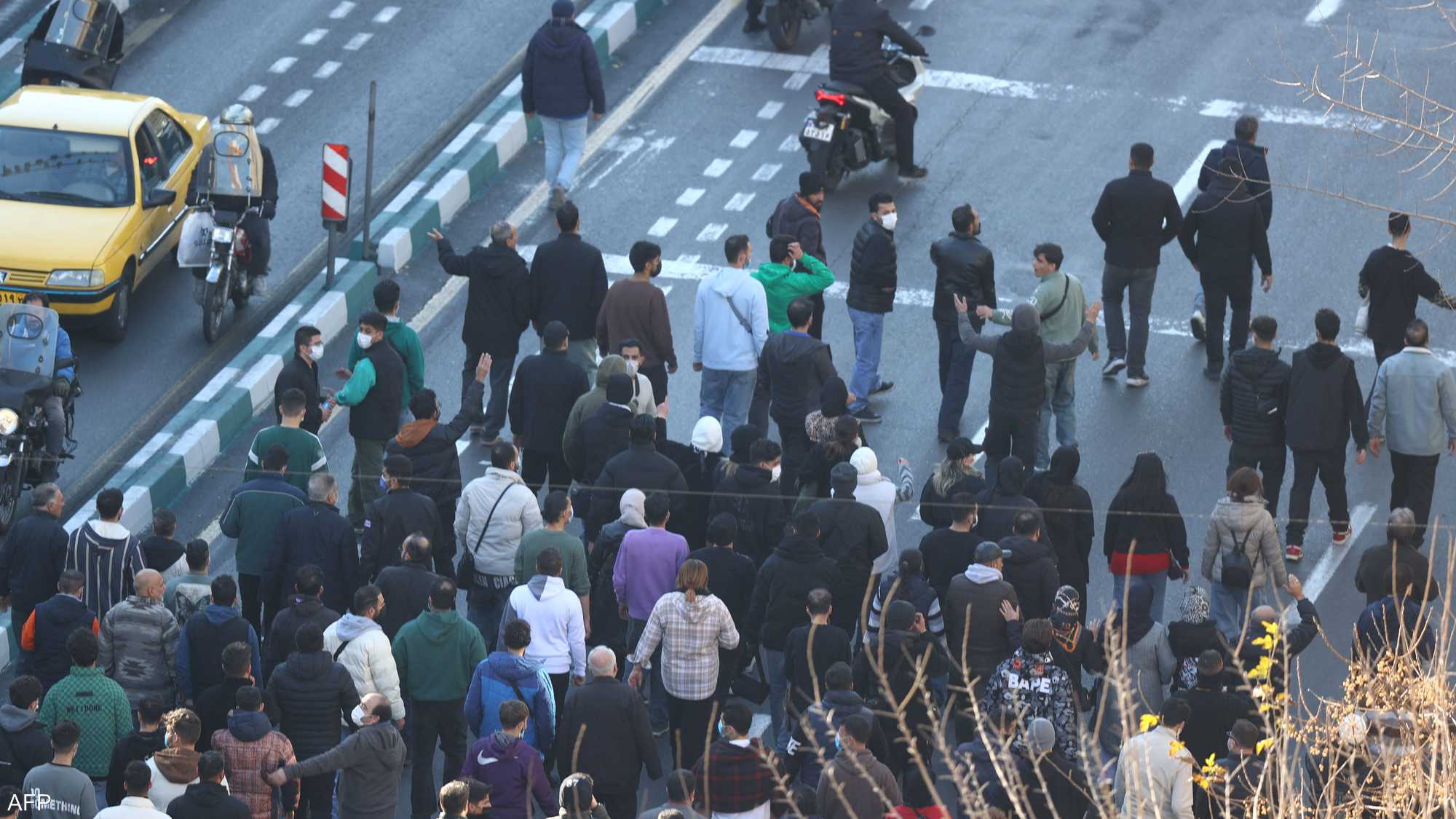 تظاهر أصحاب المحلات والتجار في شوارع طهران