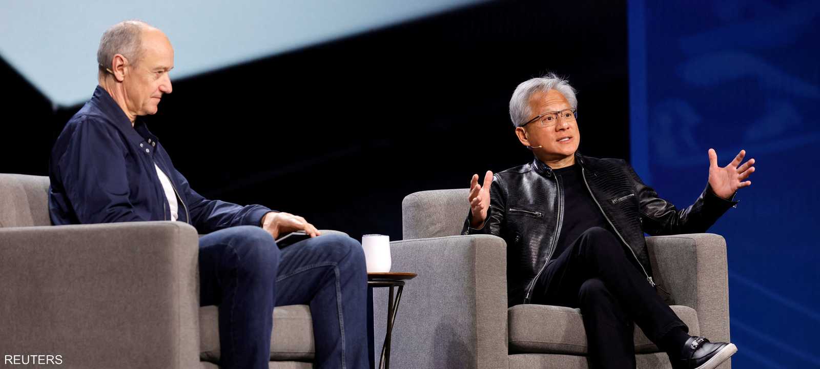 الرئيس التنفيذي لسيمنز رولاند بوش ورئيس إنفيديا جينسن هوانغ