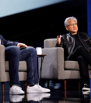 الرئيس التنفيذي لسيمنز رولاند بوش ورئيس إنفيديا جينسن هوانغ