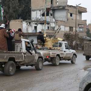 قوات تابعة للحكومة السورية في مدينة الرقة