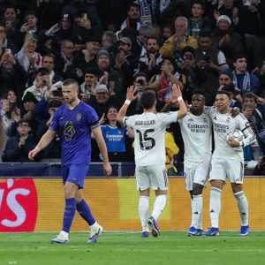 لاعبو الريال يحتفلون بالهدف الثاني في مرمى موناكو