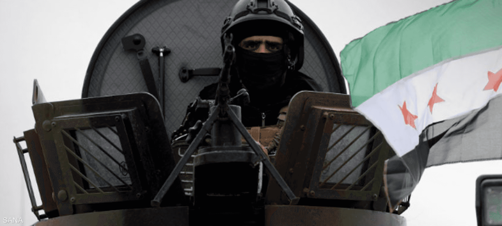 عنصر أمن سوري في الرتل المتوجه للقامشلي