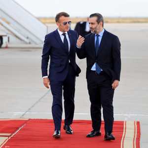 الرئيس الفرنسي ووزير الخارجية السوري