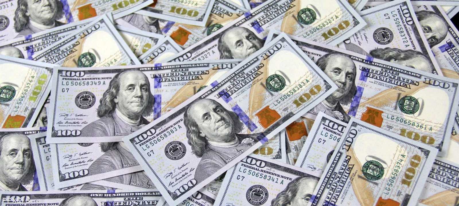 العراق يتعهد بمنع وصول الدولار إلى فصائل موالية لإيران
