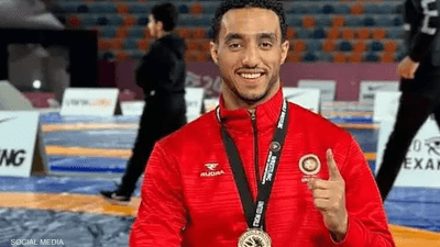 أول تعليق من بطل مصر في المصارعة بعد "الهروب"