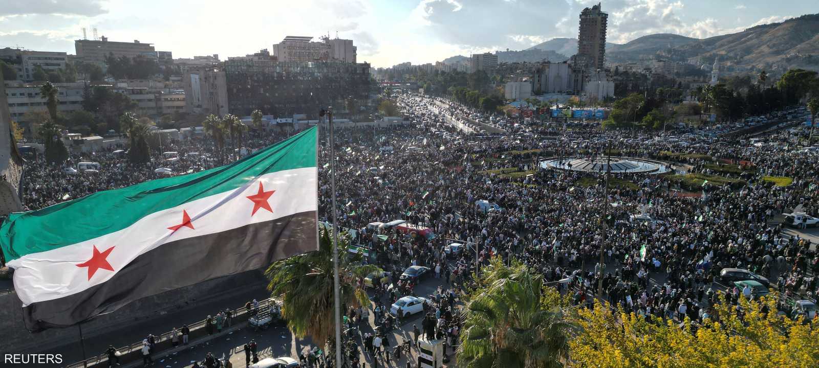 احتفالات برحيل الأسد في العاصمة السورية دمشق - أرشيفية