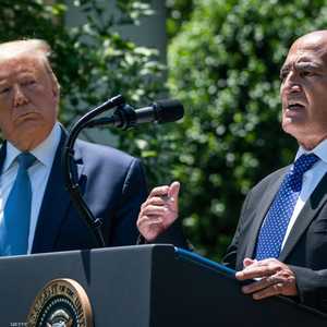 منصف السلاوي إلى جانب ترامب