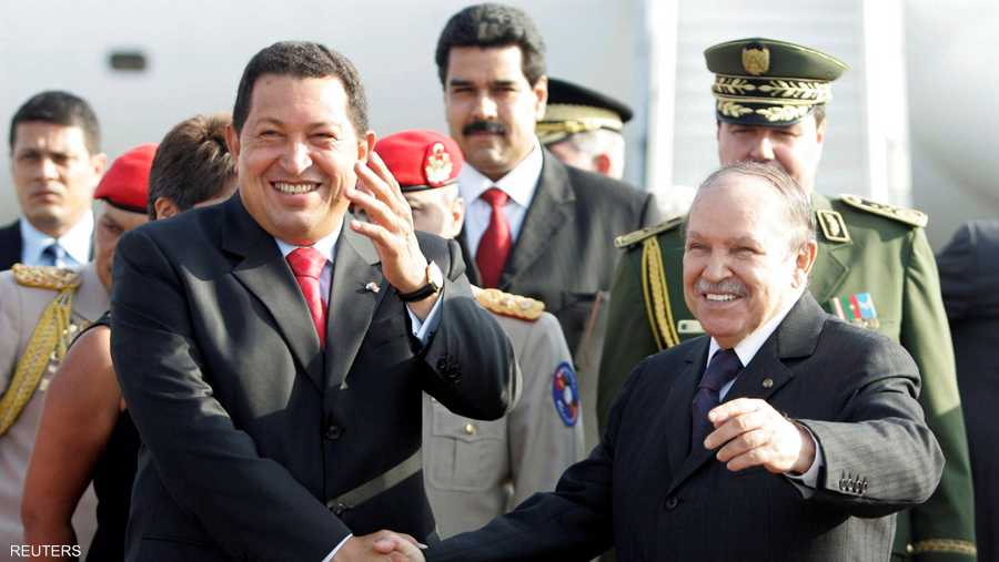 مع الرئيس الفنزويلي الراحل شافيز