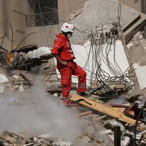 فرق الإنقاذ من موقع الغارة الإسرائيلية على الضاحية الجنوبية