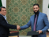أرشيفية للقاء سابق بين الشرع وعبدي