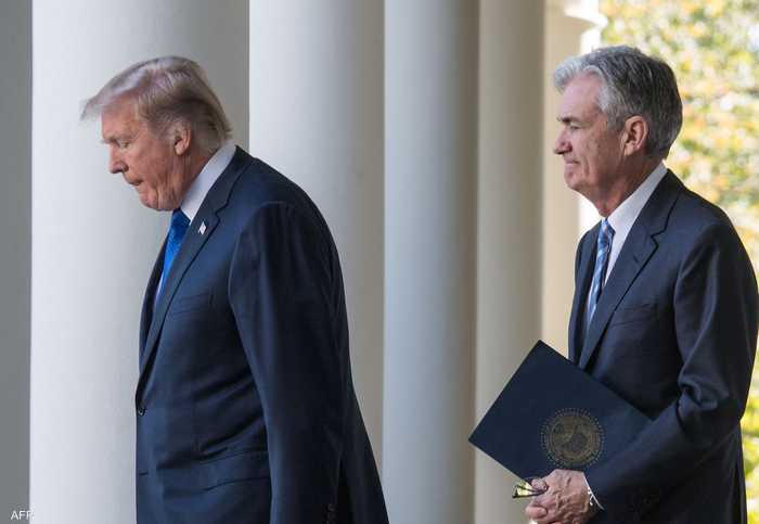 أرشيفية.. الرئيس الأميركي ترامب ورئيس الفيدرالي جيروم باول