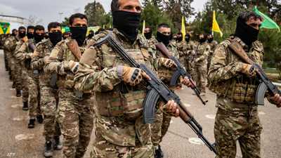 أرشيفية لمقاتلين من قوات سوريا الديمقراطية